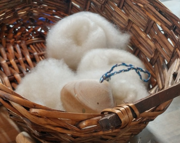 Animal fiber for cloth in a basket